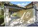 Attached carport providing sheltered parking with direct access to the home's entrance at 4333 Trails Dr # 10-1, Sarasota, FL 34232