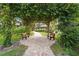 Beautiful community park with mature trees and lush landscaping at 4333 Trails Dr # 10-1, Sarasota, FL 34232