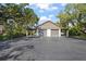 Spacious detached two-car garage, nestled among the trees with ample parking space at 4333 Trails Dr # 10-1, Sarasota, FL 34232