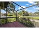 Enclosed lanai with views of the landscaped yard at 4333 Trails Dr # 10-1, Sarasota, FL 34232