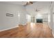 Spacious living room featuring hardwood floors, fireplace and vaulted ceilings at 4333 Trails Dr # 10-1, Sarasota, FL 34232