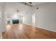 Bright and airy living room featuring hardwood floors, fireplace, and vaulted ceilings at 4333 Trails Dr # 10-1, Sarasota, FL 34232