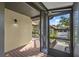 Inviting porch space with screen door access, perfect for enjoying the outdoors at 4333 Trails Dr # 10-1, Sarasota, FL 34232
