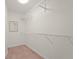 Walk-in closet featuring white wire shelving at 4333 Trails Dr # 10-1, Sarasota, FL 34232