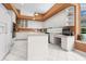 Bright kitchen featuring ample white cabinets, white countertops, and modern appliances for easy cooking at 4374 Mirabella Cir, Bradenton, FL 34210