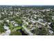 Aerial shot showcasing a residential area with lush trees, well-maintained homes, and tree-lined streets, near downtown at 5028 Oxford N Ave, St Petersburg, FL 33710