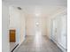 Versatile bonus room featuring tile flooring, natural light, and access to a full bathroom at 5028 Oxford N Ave, St Petersburg, FL 33710