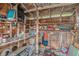 Interior view of the outdoor storage shed, filled with an assortment of tools and storage items at 5028 Oxford N Ave, St Petersburg, FL 33710