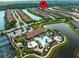 Aerial view of the community showcasing the resort-style pool, tennis courts and surrounding lakes at 5364 Salcano St, Sarasota, FL 34238