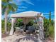 Beautiful outdoor cabana with comfortable seating, providing a relaxing space for enjoying the outdoors at 5364 Salcano St, Sarasota, FL 34238