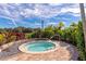 Cozy hot tub surrounded by lush greenery, offering a private and serene relaxation experience at 5364 Salcano St, Sarasota, FL 34238
