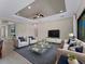 Bright living room with neutral tones, recessed lighting, ceiling fan, and comfortable seating arrangement at 5364 Salcano St, Sarasota, FL 34238