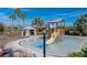 Fun splash pad with water features and play structures, perfect for to enjoy and cool off on sunny days at 5364 Salcano St, Sarasota, FL 34238