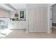 Bright laundry room area features ample counter space and storage with bright natural light at 5417 Champagne # 63, Sarasota, FL 34235