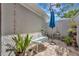 Cozy patio featuring brick pavers, a comfortable bench, and an umbrella for shade at 5417 Champagne # 63, Sarasota, FL 34235