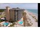 Expansive coastal condominium with multiple pools and beach access, offering luxurious waterfront living at 555 The Esplanade N # 202, Venice, FL 34285