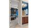Bright bathroom featuring a granite countertop, under-mount sink, framed mirror and tile shower at 584 Mast Dr, Bradenton, FL 34208