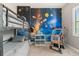 bedroom with bunk beds and a space themed wallpaper at 584 Mast Dr, Bradenton, FL 34208