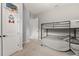 bedroom with bunk beds, neutral walls, and carpeted floors at 584 Mast Dr, Bradenton, FL 34208