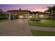 Stunning single-Gathering home featuring a porte-cochere and lush landscaping at 584 Mast Dr, Bradenton, FL 34208
