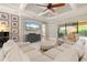 Inviting living area with modern decor, stylish furniture, and a large flat-screen TV at 584 Mast Dr, Bradenton, FL 34208
