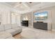 Comfortable living area featuring a piano, entertainment center, and stylish decor at 584 Mast Dr, Bradenton, FL 34208