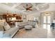 Bright and airy living space with open layout, connecting the kitchen, dining, and entry areas at 584 Mast Dr, Bradenton, FL 34208
