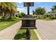 Decorative curbside mailbox with address numbers in front of a lovely home at 584 Mast Dr, Bradenton, FL 34208