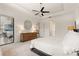 Bright main bedroom with an adjoining bathroom and a private outdoor area, perfect for relaxation at 584 Mast Dr, Bradenton, FL 34208
