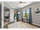 A bright main bedroom that leads to the pool and a soaking tub with view to the pool area at 584 Mast Dr, Bradenton, FL 34208