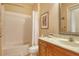 Cozy bathroom with tub, shower, and vanity; perfect for relaxing or getting ready in the morning at 6214 45Th E Ln, Bradenton, FL 34203