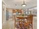 Charming dining area adjacent to the kitchen and living room, perfect for casual meals at 6214 45Th E Ln, Bradenton, FL 34203