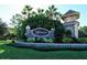 Mandalay deed restricted community entrance sign surrounded by lush tropical landscaping, showcasing a secure neighborhood at 6214 45Th E Ln, Bradenton, FL 34203
