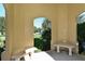 Seating in a gazebo with a view of a grassy play area, offering a serene place to relax at 6214 45Th E Ln, Bradenton, FL 34203