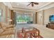 Cozy living room with large sliding doors to the lanai, offering a bright and airy atmosphere at 6214 45Th E Ln, Bradenton, FL 34203