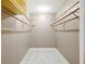 Walk-in closet with installed shelving and rack system at 6633 Old Ranch Rd, Sarasota, FL 34241