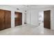 Large bedroom with two closets, ceiling fan and doorway to a bathroom at 6707 Northampton Pl, Bradenton, FL 34207
