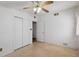Bedroom with ceiling fan, hard floors and closet at 6707 Northampton Pl, Bradenton, FL 34207