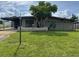 Single-story home with a well-maintained lawn and mature tree in the front yard at 6707 Northampton Pl, Bradenton, FL 34207
