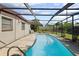Enjoy the refreshing screened-in pool, perfect for outdoor relaxation and entertaining with a secure screened enclosure at 6707 Northampton Pl, Bradenton, FL 34207