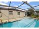 Beautiful in-ground pool with a clear blue hue and surrounding patio space for outdoor relaxation at 6707 Northampton Pl, Bradenton, FL 34207