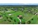 Aerial view of a sprawling estate with lush greenery, ponds, and a beautiful home and barn at 6805 225Th E St, Bradenton, FL 34211