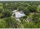 Areal view of lush home and surrounding landscape at 7343 Palomino Trl, Sarasota, FL 34241