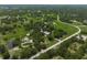 Serene aerial view highlighting the peaceful setting and lush greenery surrounding this homesite at 7343 Palomino Trl, Sarasota, FL 34241