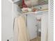 Walk-in closet with shelving and a rod for hanging clothes and access to another room at 7343 Palomino Trl, Sarasota, FL 34241