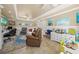 Spacious living room featuring a desk, neutral walls and a comfortable seating area at 7343 Palomino Trl, Sarasota, FL 34241