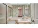 Functional bathroom with a shower, marble countertop, and neutral color scheme for a comfortable atmosphere at 7426 Weeping Willow Blvd, Sarasota, FL 34241