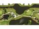 Overhead view of an immaculate golf course layout featuring winding fairways, water features, and sand traps at 7461 W Country Club N Dr # 206, Sarasota, FL 34243