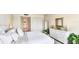 Comfortable bedroom boasting generous natural light and a serene atmosphere with a spacious closet at 7461 W Country Club N Dr # 206, Sarasota, FL 34243