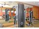 Community fitness center with modern Life Fitness equipment and mirrored wall at 7915 115Th E Ave, Parrish, FL 34219